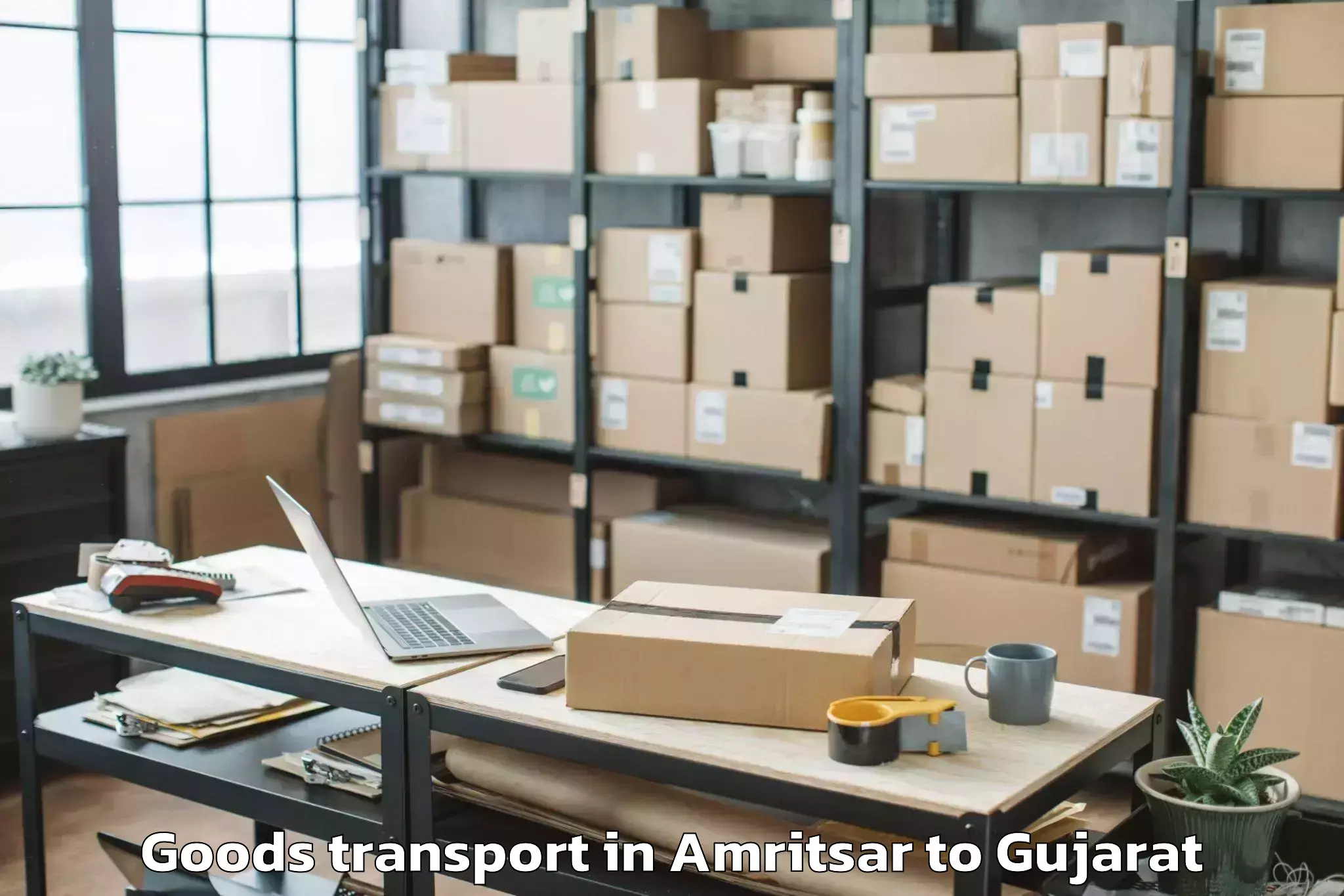 Comprehensive Amritsar to Ahmedabad Airport Amd Goods Transport